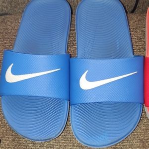 Three Nike Slides